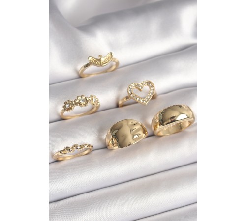Pirinç Gold Renk Zirkon Taşlı Kalp Figür Çiçek Detay 6'Lı Kadın Yüzük Seti Pirinç Gold Renk Zirkon Taşlı Kalp Figür Çiçek Detay 6'Lı Kadın Yüzük Seti