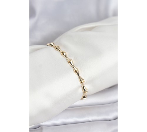 Pirinç Gold Renk VIP Seri Kemik Model Zirkon Taşlı Kadın Bileklik