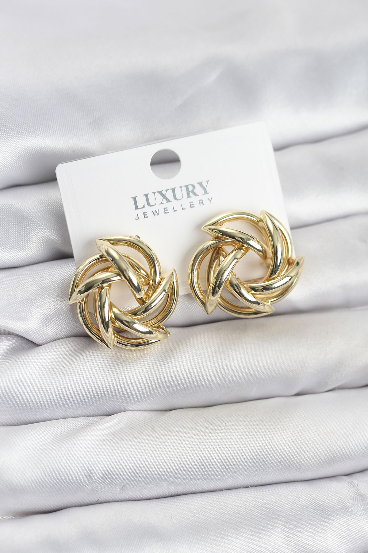 Gold Renk Pirinç Keskin Sarmal Model Kadın Küpe